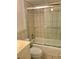 Bathroom with shower/tub combo and tile surround at 12760 Indian Rocks Rd # 562, Largo, FL 33774