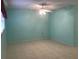 Bright bedroom with light teal walls and ceiling fan at 12760 Indian Rocks Rd # 562, Largo, FL 33774