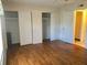 Bedroom with double closets and wood-look floors at 12760 Indian Rocks Rd # 562, Largo, FL 33774