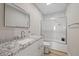 Clean bathroom, featuring a bathtub and granite countertop at 1504 E Mcberry St, Tampa, FL 33610