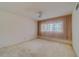 Large bedroom with window and ceiling fan at 2351 Irish Ln # 55, Clearwater, FL 33763