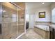 Bathroom featuring a large walk-in shower and soaking tub at 26888 Fiddlewood Loop, Wesley Chapel, FL 33544