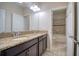 Elegant bathroom with granite countertops and a shower/tub combo at 26888 Fiddlewood Loop, Wesley Chapel, FL 33544
