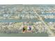 Aerial view showing a single Gathering home on a waterfront lot at 3276 Sea Grape Dr, Hernando Beach, FL 34607