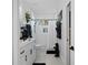 Clean bathroom with white vanity, shower, and gray flooring at 3276 Sea Grape Dr, Hernando Beach, FL 34607