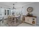 Elegant dining room with a large table and charming decor at 3276 Sea Grape Dr, Hernando Beach, FL 34607