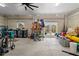 Garage with water access, workspace, and various storage options at 3276 Sea Grape Dr, Hernando Beach, FL 34607