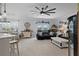 Relaxing living room featuring a ceiling fan and comfortable seating at 3276 Sea Grape Dr, Hernando Beach, FL 34607