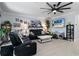 Bright living room with comfortable seating and a large TV at 3276 Sea Grape Dr, Hernando Beach, FL 34607