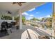 Waterfront patio with seating area and canal views at 3276 Sea Grape Dr, Hernando Beach, FL 34607