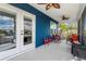 Outdoor screened porch with water views and comfortable seating at 3276 Sea Grape Dr, Hernando Beach, FL 34607