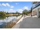 Backyard with canal access and grassy area at 3276 Sea Grape Dr, Hernando Beach, FL 34607