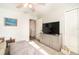 Bright bedroom with large TV, ample closet space and natural light at 5956 Nyberg Rd, North Port, FL 34291