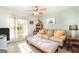 Cozy bonus room with light walls and a comfy sofa at 5956 Nyberg Rd, North Port, FL 34291
