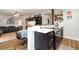 Open concept kitchen with breakfast bar and modern finishes at 5956 Nyberg Rd, North Port, FL 34291