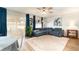 Living room with sectional sofa and access to backyard patio at 5956 Nyberg Rd, North Port, FL 34291