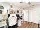Bright home office with built in shelving and white desk at 5956 Nyberg Rd, North Port, FL 34291