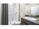 Full bathroom with shower, toilet and granite countertop at 6847 Daintree Ct, Land O Lakes, FL 34638