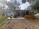 Backyard with patio and covered seating area at 7424 Grand Blvd, New Port Richey, FL 34652