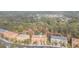 Townhome community near a pond and lush trees at 9024 White Sage Loop # 37, Lakewood Ranch, FL 34202