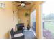 Relaxing enclosed patio with seating and plants at 9024 White Sage Loop # 37, Lakewood Ranch, FL 34202