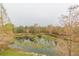 Scenic view of a pond with lush vegetation at 9024 White Sage Loop # 37, Lakewood Ranch, FL 34202
