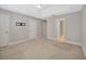 Carpeted bedroom with neutral walls and ample closet space at 11728 Cambium Crown Dr, Riverview, FL 33569