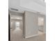 Bright hallway with doors leading to bedrooms and a bathroom at 11728 Cambium Crown Dr, Riverview, FL 33569