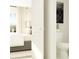 Bright bathroom with toilet and view into bedroom at 11907 Blue Diamond Trl, Parrish, FL 34219