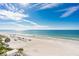 Stunning aerial view of a pristine beach with clear water at 20040 Gulf Blvd # 605, Indian Shores, FL 33785