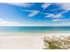 Expansive beach view, showcasing white sand and turquoise water at 20040 Gulf Blvd # 605, Indian Shores, FL 33785