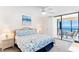 Ocean view bedroom with king-size bed and private balcony at 20040 Gulf Blvd # 605, Indian Shores, FL 33785