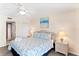 King size bed, ocean view, and ensuite bathroom at 20040 Gulf Blvd # 605, Indian Shores, FL 33785