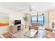 Relaxing living room with ocean views and comfortable seating at 20040 Gulf Blvd # 605, Indian Shores, FL 33785