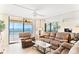 Spacious living room with ocean view and two sofas at 20040 Gulf Blvd # 605, Indian Shores, FL 33785