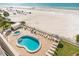 Relaxing pool and hot tub area with beach access, perfect for enjoying the Florida sun at 20040 Gulf Blvd # 605, Indian Shores, FL 33785