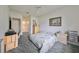 Spacious bedroom with a floral comforter and built-in desk at 2620 Newcomb Ct, Sun City Center, FL 33573