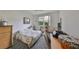 Cozy bedroom with window and workspace at 2620 Newcomb Ct, Sun City Center, FL 33573