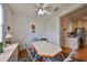 Dining area with table and chairs, kitchen access at 2620 Newcomb Ct, Sun City Center, FL 33573