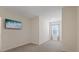 Bedroom with TV, window, and neutral wall colors at 2920 Evergreen Elm Pass, Wesley Chapel, FL 33543