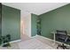 Spacious bedroom with wood-look floors and an accent wall at 2920 Evergreen Elm Pass, Wesley Chapel, FL 33543