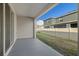 Covered patio with access to backyard at 2920 Evergreen Elm Pass, Wesley Chapel, FL 33543