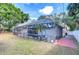 Enclosed pool with surrounding patio and backyard at 3613 S Omar Ave, Tampa, FL 33629
