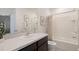 Bathroom with tub shower combination, vanity and toilet at 5019 Gilded Bard Ct, Wimauma, FL 33598
