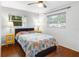 Bright bedroom with hardwood floors, ceiling fan and sunny windows at 538 Southwest N Blvd, St Petersburg, FL 33703