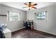 Bedroom with laminate floors, ceiling fan, and two windows for lots of natural light at 538 Southwest N Blvd, St Petersburg, FL 33703