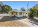 Charming single-story home with a well-maintained lawn and a welcoming covered entrance at 538 Southwest N Blvd, St Petersburg, FL 33703