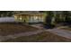 Charming single-story home featuring a cozy front porch and well-maintained landscaping at 538 Southwest N Blvd, St Petersburg, FL 33703