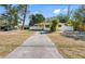 Cute yellow house with a long driveway at 538 Southwest N Blvd, St Petersburg, FL 33703