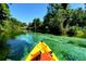 Kayaking in a clear river surrounded by lush trees at 538 Southwest N Blvd, St Petersburg, FL 33703